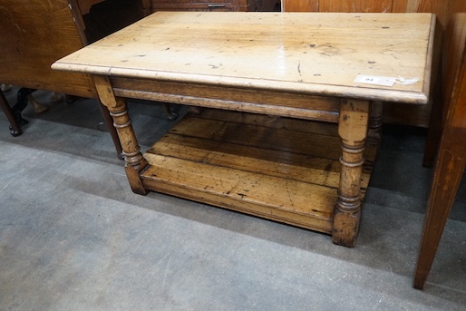 An 18th century style pale oak two tier coffee table, length 91cm, depth 50cm, height 45cm